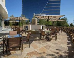 Beautiful outdoor terrace perfect as workspace at the Hilton Dallas Plano Granite Park.