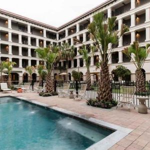 Stunning outdoor pool with pool chairs at The Modern Honolulu.