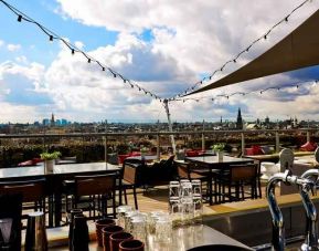 Beautiful outdoor terrace overlooking the city at the DoubleTree by Hilton Amsterdam Centraal Station.