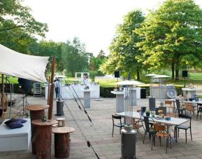 Outdoor patio perfect for co-working at the DoubleTree by Hilton Royal Parc Soestduinen.