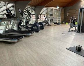 well equipped fitness center at Hilton Cobham.