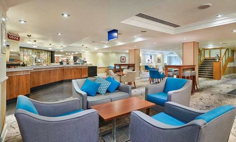 Comfortable lounge and coworking space at Hilton London Watford.