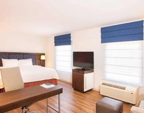 comfortable delux king room with work area ideal for working remotely at Hampton Inn & Suites by Hilton San Jose-Airport.