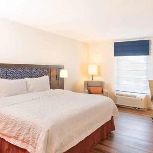 spacious king room with TV and work desk ideal to work remotely at Hampton Inn & Suites by Hilton San Jose-Airport.