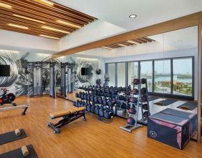 well equipped fitness center at DoubleTree by Hilton Sharjah Waterfront Hotel & Residences.