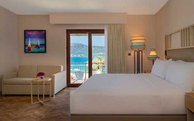 beautiful king suite with lounge and sea views at DoubleTree by Hilton Bodrum Isil Club Resort.