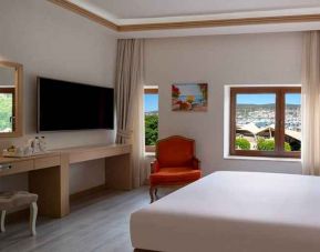 stunning king room with TV, work area, and beautiful sea views at DoubleTree by Hilton Bodrum Marina Vista.