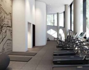 Fitness center with treadmills at the Hilton Amsterdam Airport Schiphol.