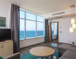 Living room perfect as workspace at the Hilton Garden Inn Tanger City Center.