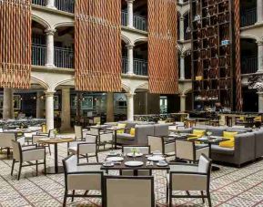 Beautiful outdoor patio perfect for co-working at the Hotel 1970 Guadalajara, Curio Collection by Hilton.
