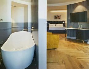 luxurious suite with relaxing bath tub at Casa Alberola Alicante, Curio Collection by Hilton.