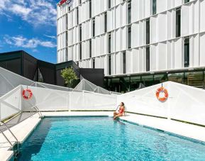 lovely and large outdoor pool at Hampton by Hilton Alcobendas Madrid.