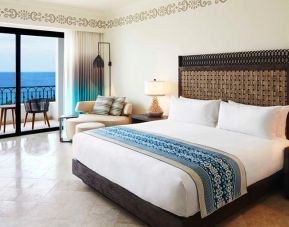 King bedroom with working station overlooking the ocean at the Hilton Los Cabos Beach & Golf Resort.