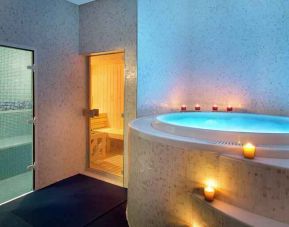 Relaxing spa area with jacuzzi at the DoubleTree by Hilton Doha - Old Town.