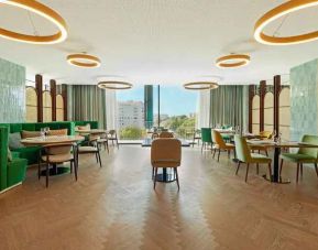 Lobby workspace at the Boeira Garden Hotel Porto Gaia, Curio Collection by Hilton.
