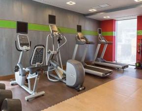 well equipped fitness center with treadmills and weights at Hampton by Hilton Samsun.