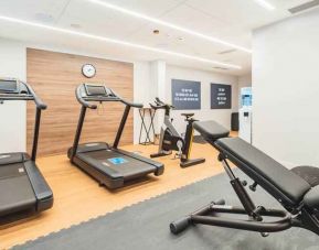 Fitness center with treadmills at the Hampton by Hilton Warsaw Reduta.