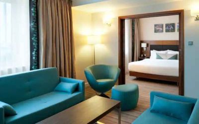 Comfortable living room in a hotel guestroom at the Hilton Garden Inn Krakow.