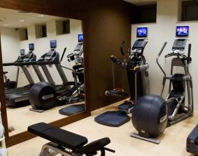 Fitness center with machines at the Hilton Garden Inn Krakow.