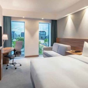 Bright queen room with view at the Hampton by Hilton Warsaw Mokotow.