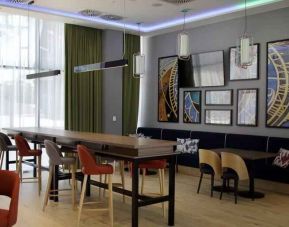 Bright hotel workspace at the Hampton by Hilton Olsztyn.