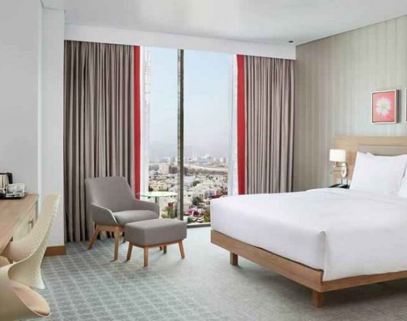 King superior room with desk at the Hilton Garden Inn Muscat Al Khuwair.