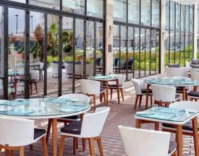 Outdoor seating perfect for co-working at the Hilton Garden Inn Muscat Al Khuwair.
