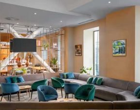 comfortable lobby and coworking space at Hilton Garden Inn Bucharest Old Town.