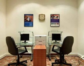 Business center with computers and printer at the Madinah Hilton Hotel.