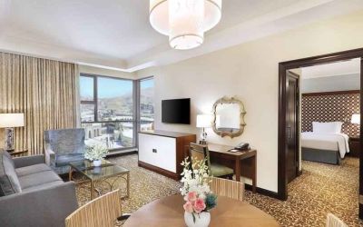 Living room with working station at the Hilton Suites Makkah.