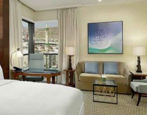 King bedroom with desk and sofa at the Conrad Makkah.