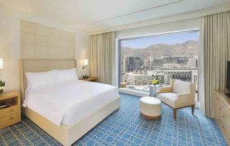 King bedroom with view at the Hilton Makkah Convention Hotel.