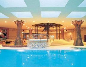 lovely indoor pool with jacuzzi at Hilton Fukuoka Sea Hawk.