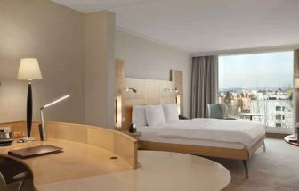 Spacious hotel room with working station at the Hilton Zurich Airport.