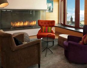 Executive lounge by the fireplace at the Hilton Stockholm Slussen.