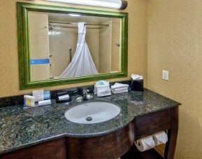 Clean and spacious king bathroom with shower at at Hampton Inn & Suites Lebanon.