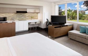 King guestroom with kitchenette at the Element Miami International Airport.