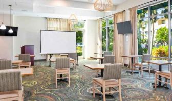 Bright meeting room with large windows at Embassy Suites by Hilton Oahu Kapolei.