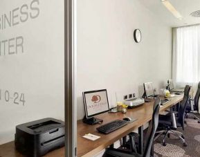 dedicated business center with PC, internet, printer, and workspace at DoubleTree by Hilton Zagreb.