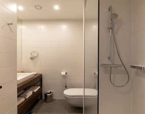 clean and spacious king bathroom with shower at Hilton Garden Inn Zagreb - Radnicka.