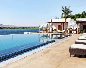 stunning outdoor pool with sunbeds at Hilton Luxor Resort & Spa.