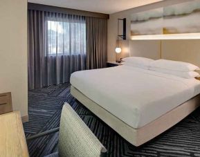 spacious king room with work area and business desk at Embassy Suites by Hilton San Rafael Marin County.