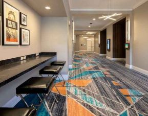 spacious connectivity center ideal for digital nomads at Embassy Suites by Hilton San Rafael Marin County.