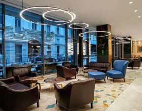 comfortable lobby and coworking space at Hilton Garden Inn Budapest City Centre.
