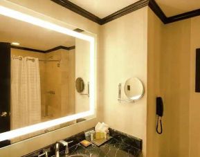 guest bathroom with shower at Hilton Princess San Pedro Sula.