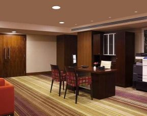 dedicated business center with PC, business desk, printer, and internet at Hilton Garden Inn Trivandrum.