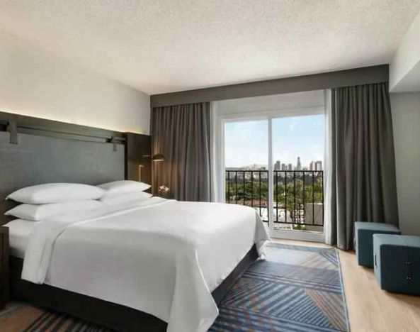 Comfortable king room at the Embassy Suites by Hilton Los Angeles Downey.