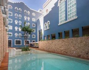 Outdoor pool at the Villa Mercedes Merida, Curio Collection by Hilton.