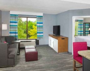 Living room perfect as workspace at Hampton Inn & Suites Annapolis.