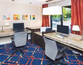 dedicated business center equipped with PCs, internet, printers, and work desk ideal for working remotely at Hampton Inn & Suites Annapolis.